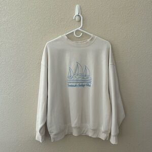 Woman’s pullover. Never been worn.